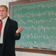 Bush shows Fermilab scientists where they went wrong in their calculations.